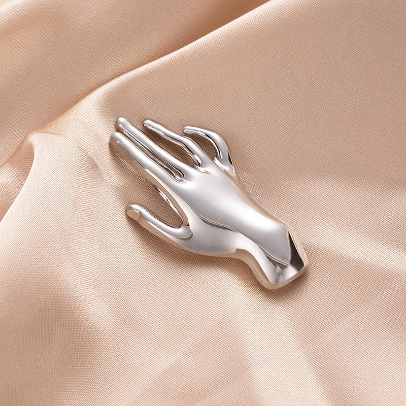 European & American High-End 3D Palm Brooch - Minimalist, Fashionable, Unique Corsage for Women
European & American High-End 3D Palm Brooch - Minimalist, Fashionable, Unique Corsage for Women