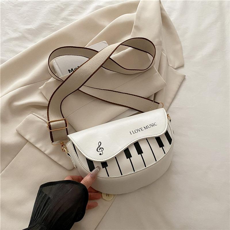 Summer new beautiful piano pattern casual small square bag girl retro casual shoulder messenger bag bag woman білий
Summer new beautiful piano pattern casual small square bag girl retro casual shoulder messenger bag bag woman білий