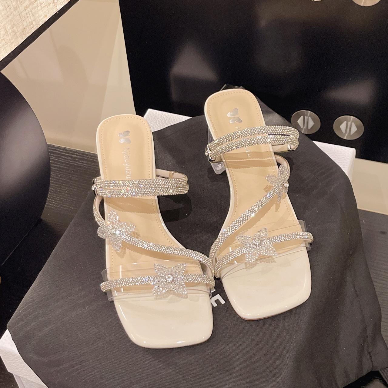 Slippers women s outer wear 2025 summer new shoes thick heel high heel women s shoes rhinestone transparent crystal with skirt sandals 35
Slippers women s outer wear 2025 summer new shoes thick heel high heel women s shoes rhinestone transparent crystal with skirt sandals 35