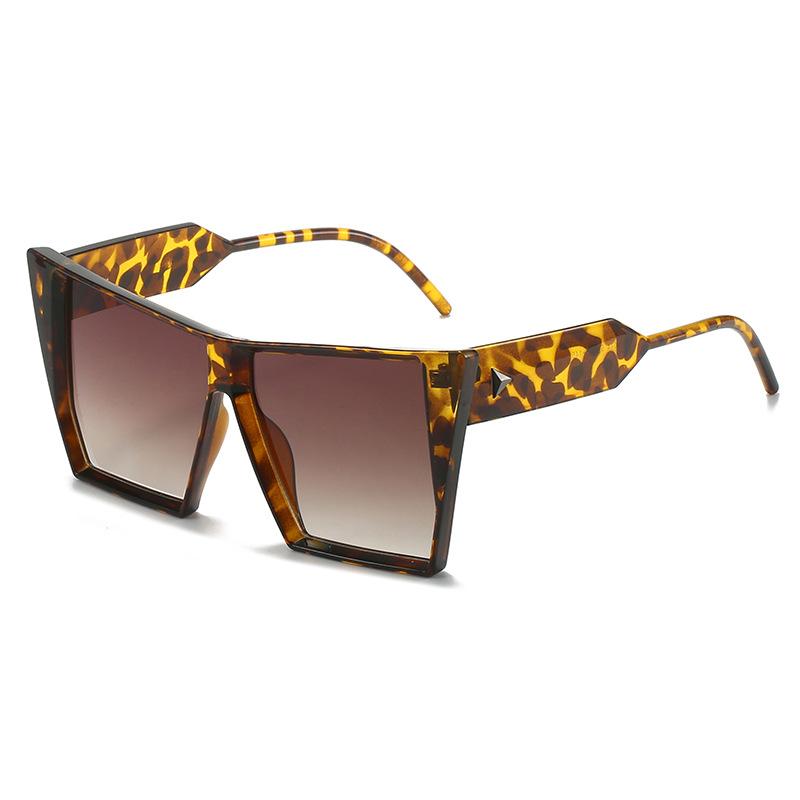 New sunglasses, European and American personalized cat eye large-frame glasses, fashionable triangular rivet sunglasses for women