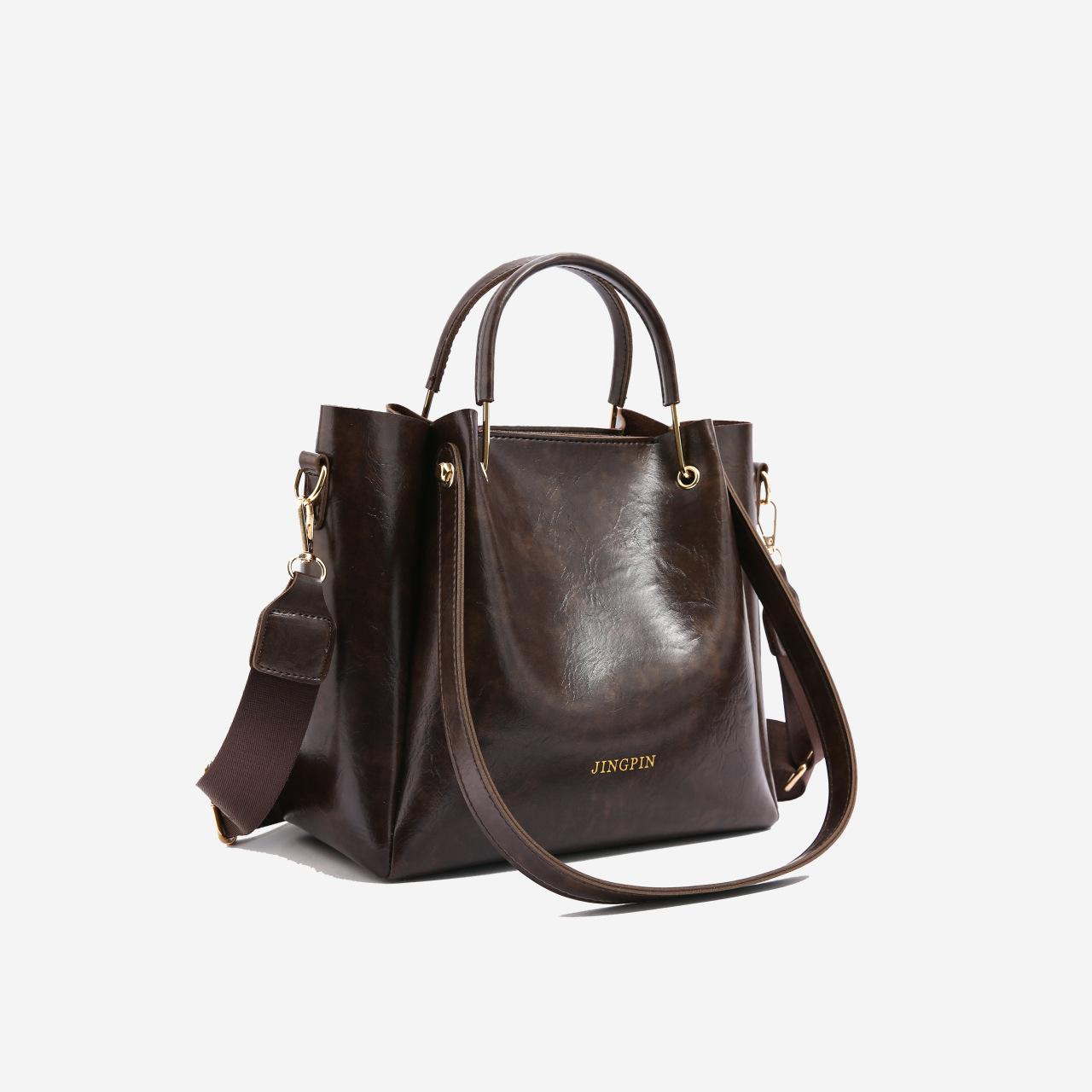 

Popular bags women s new retro simple fashion broadband shoulder messenger bag portable large-capacity bucket bag темно-коричневого кольору