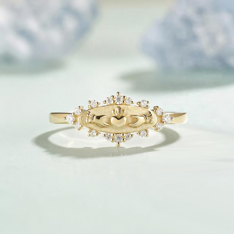 An Elegant Golden Ring with A Symbol of Love, A Sparkling Zircon, An Accessory for Special Occasions and Nights