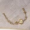 Orologio Bracciale a Cuore con Fiocco Oro Retrò per Donna