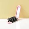 Portable Multi-color Folding Cushion Comb & Mirror for Travel Hair Styling and Makeup Touch-ups