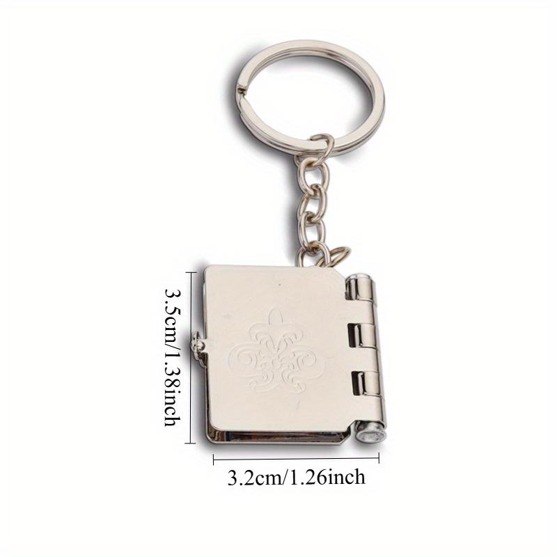 

1 шт. Креативный складной брелок в виде маленькой книжки, Брелок, Мини-металлический брелок с маленькой фоторамкой, Брелок с памятной наклейкой о путешествии, 1pc