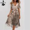 Abiti casual a vita alta con scollo a V a maniche corte con stampa floreale primaverile alla moda da donna