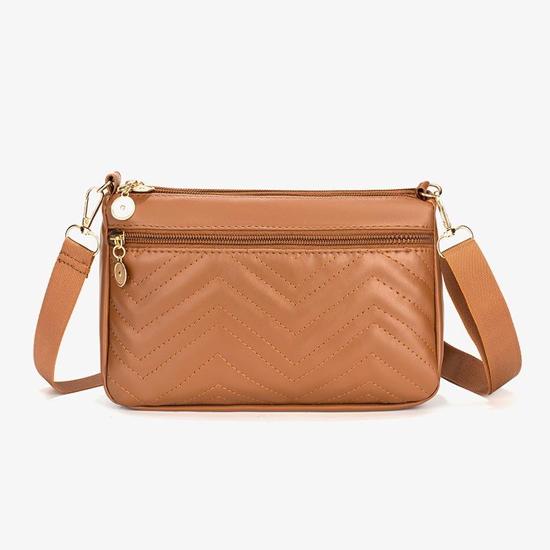 

Autumn and winter simple personality wave embroidered square bag fashionable versatile women s crossbody shoulder bag front bag storage mobile phone світло-коричневого кольору