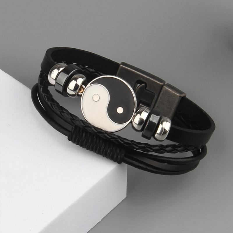 

Горячая мода Черно-белый Тай Чи Snap Кнопка Ручная работа Кожа Плетеный браслет Инь Ян Ювелирные изделия Стимпанк Мужчины Женщины Подарки
