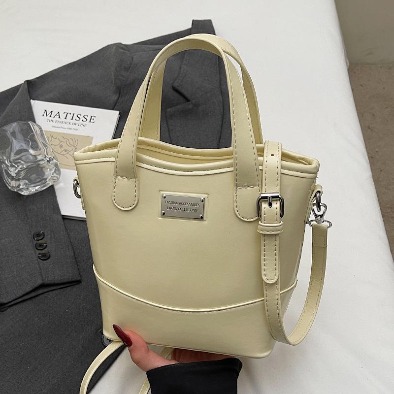 Koreańska wersja popularnej prostej wysokiej jakości koreańskiej przenośnej torby-wiadra modna wszechstronna styl commuter miejski casualowa torba listonoszka damska