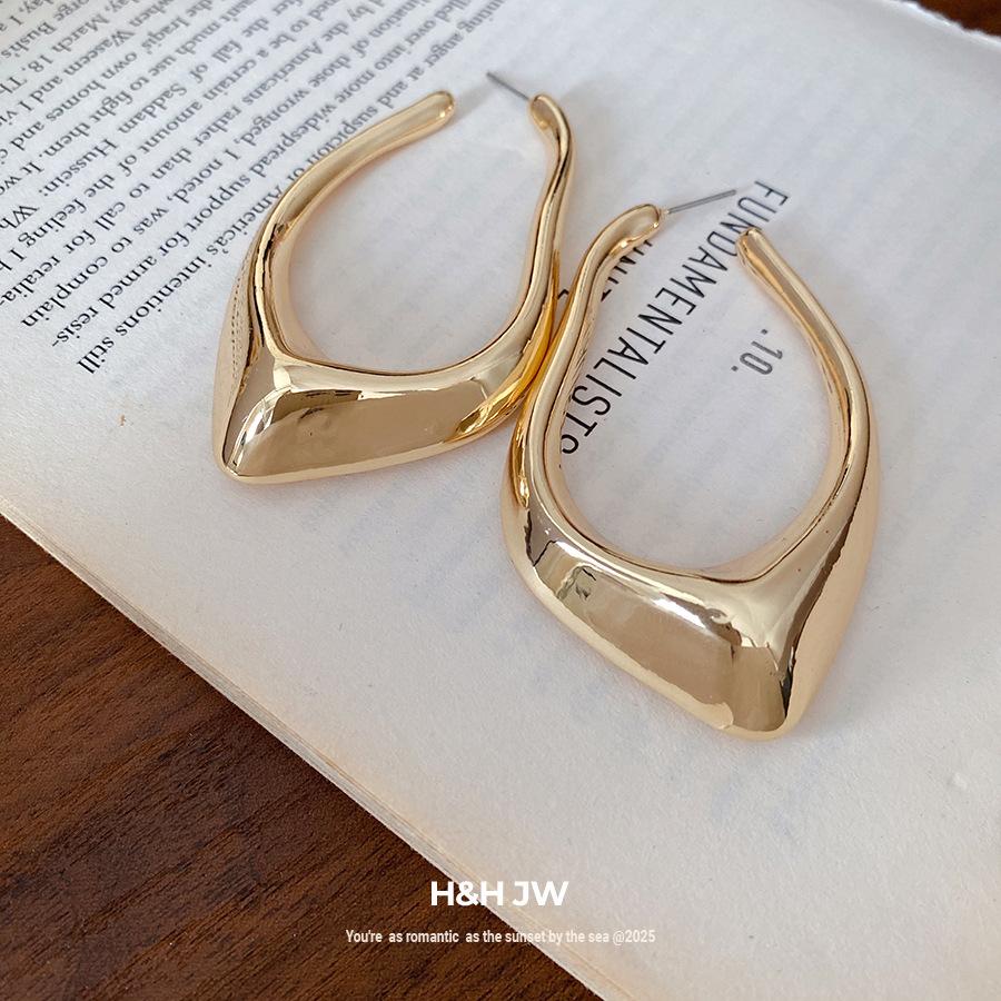 Silver needle geometric irregular hollow earrings light luxury high-end earrings simple cold wind earrings design sense niche