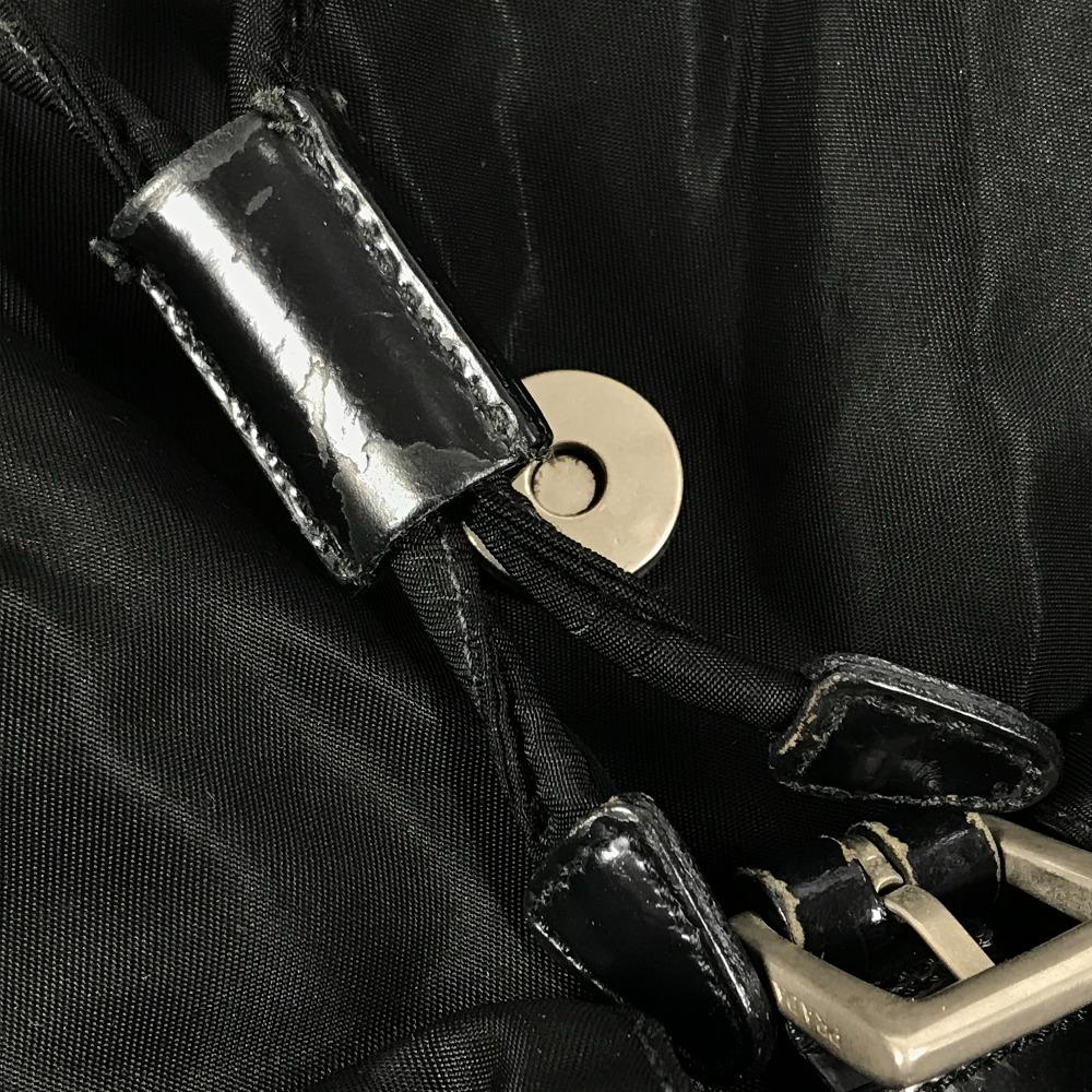 Prada Tasche mit dreieckiger Logo-Platte Rucksack Leder / Nylon Schwarz