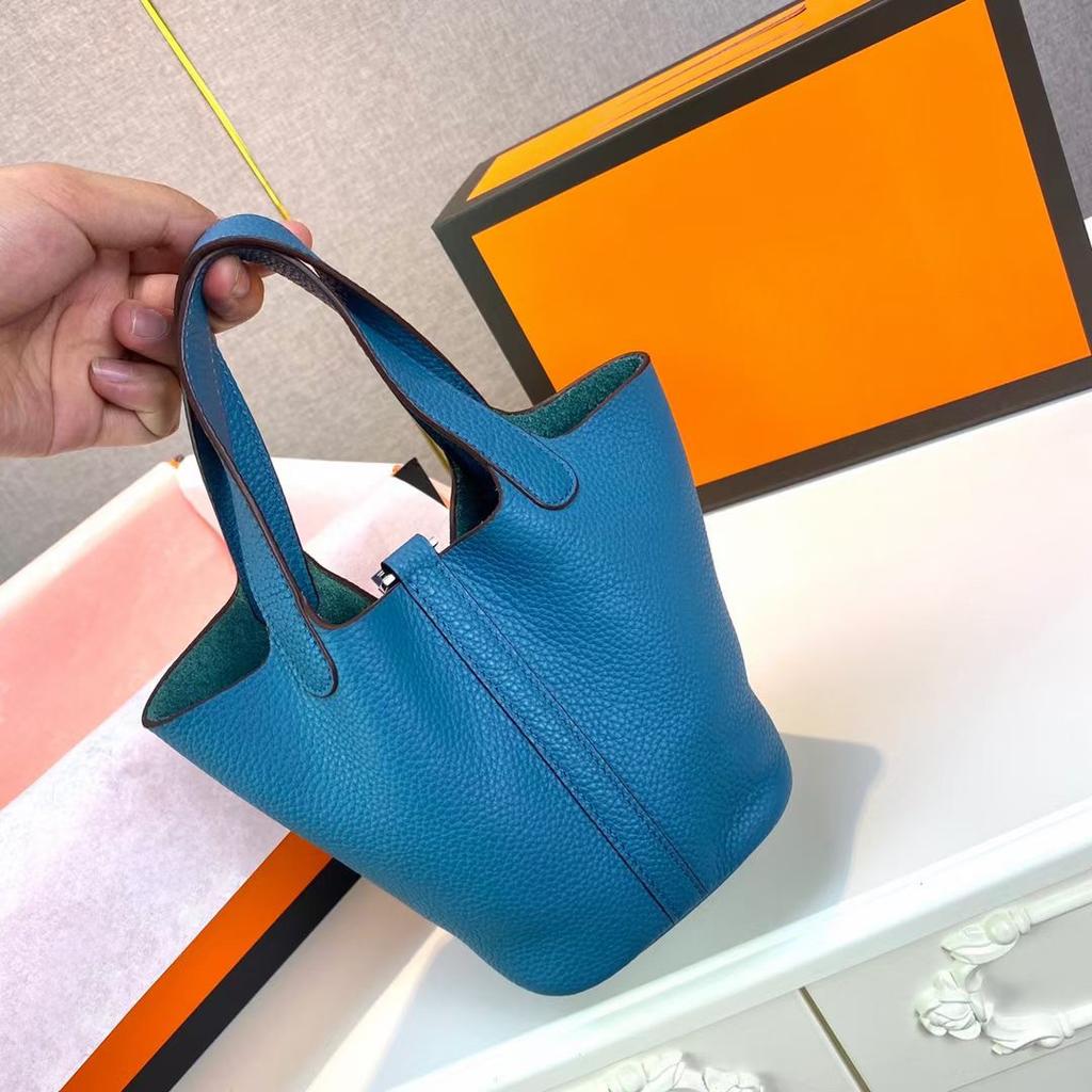 Hochwertige halbhandgefertigte Gemüsekorbtasche togo erste Schicht Rindsleder Pendlertasche echtes Leder tragbare Beuteltasche Damen 18cm