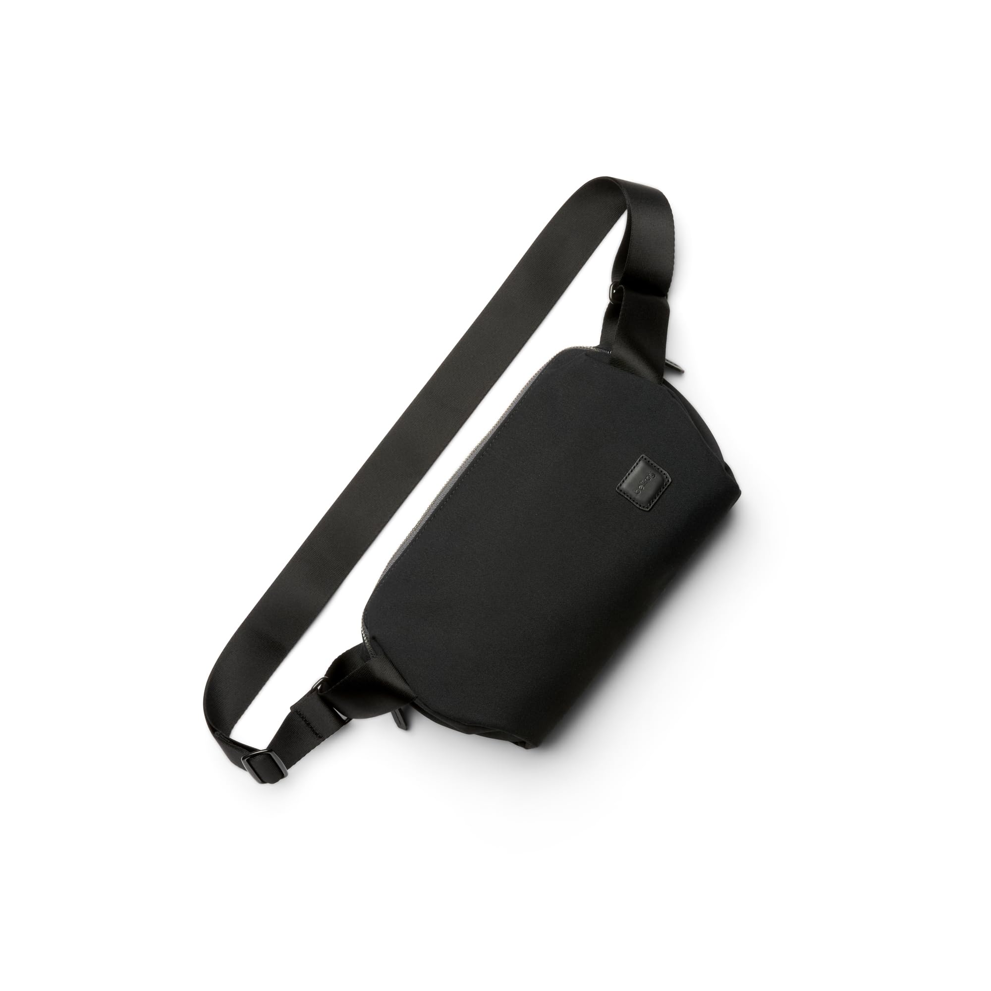 

Bellroy Classic Sling, a minimalist 5L body bag perfect for everyday use. Organized storage, adjustable straps, and expandablecompressible storage -