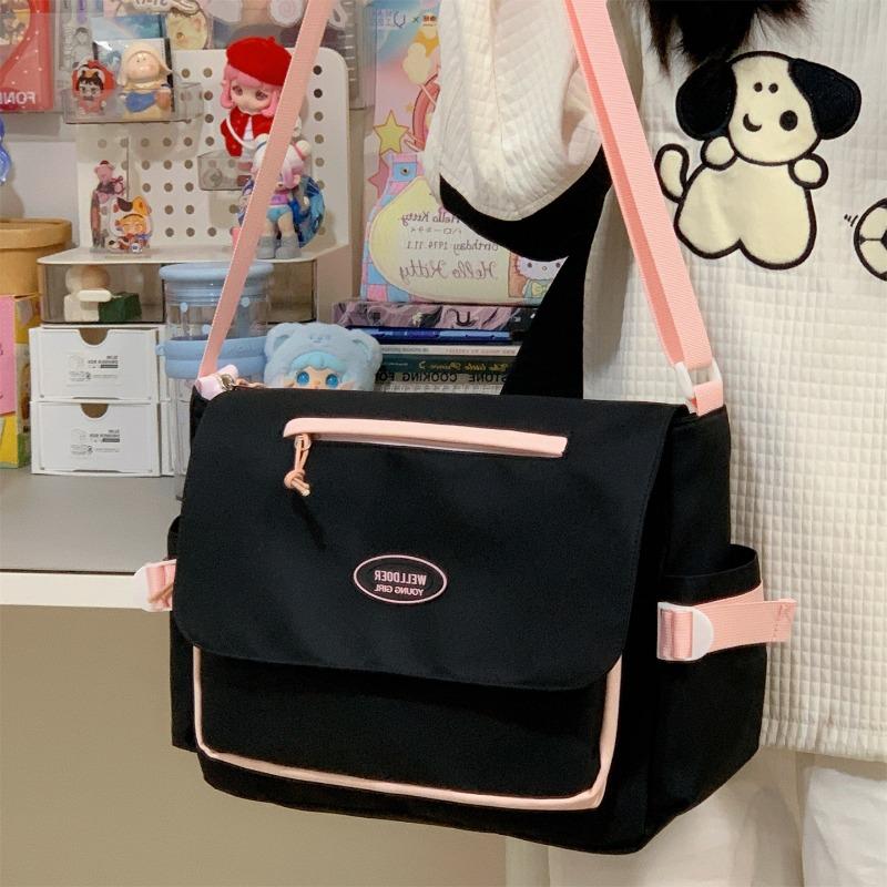 

The new schoolbag is high-value, fresh and sweet, and the candy-colored satchel is a girl s lightweight spring outing large-capacity messenger bag.