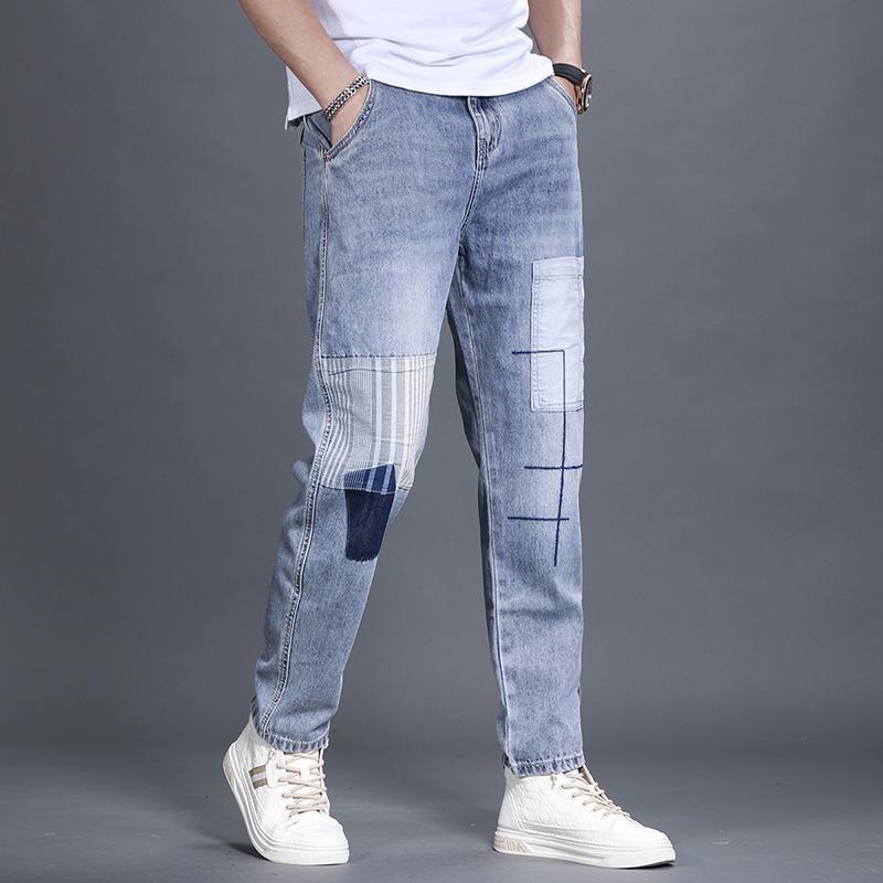 Pantaloni da uomo Patchwork Splicing Denim Primavera e Autunno Piedi Piccoli Tendenza Hip-hop Casual Versatili Taglie Forti