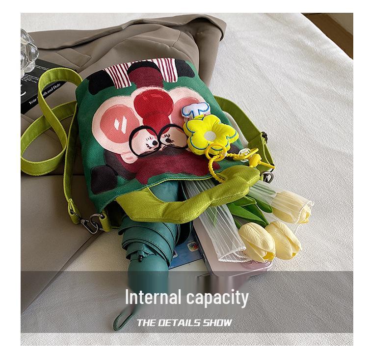 2025 Grenzüberschreitende Cartoon-Graffiti-Handtasche: Nischendesign Bucket Schulter- & Umhängetasche für Damen