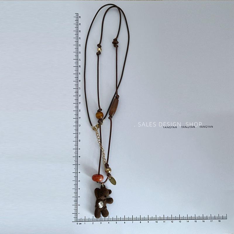 Kawa Kolorowy Pluszowy Wisiorek Niedźwiedź Naszyjnik z Łańcuszkiem do Swetra - 2025 Luksus & Moda