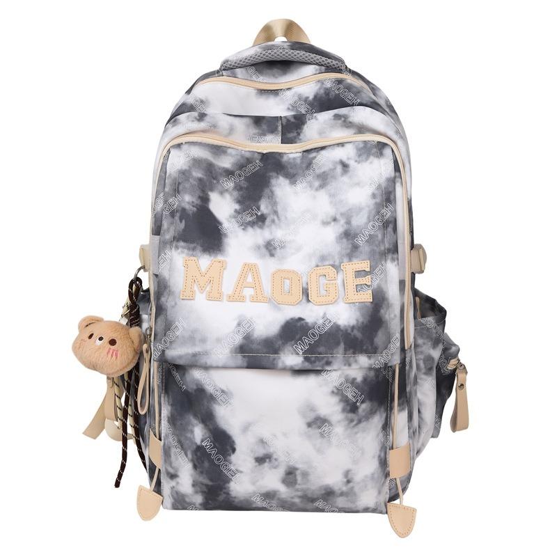 Der neue Schulranzen ist hochwertig, frisch und süß, ein Rucksack mit literarischem Graffiti-Tie-Dye und ein leichter Rucksack für Junior- und Oberstufenschüler.