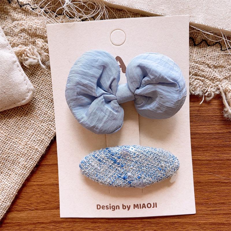 

Blue Floral Fabric Embroidered Cross Girl s Hair Clips