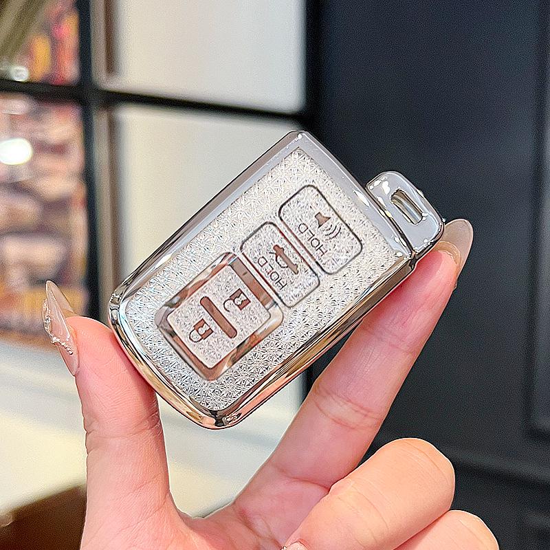 Fits Toyota Camry 7th Gen (2016/2017) and Land Cruiser (2012) models, includes key cover and clips.