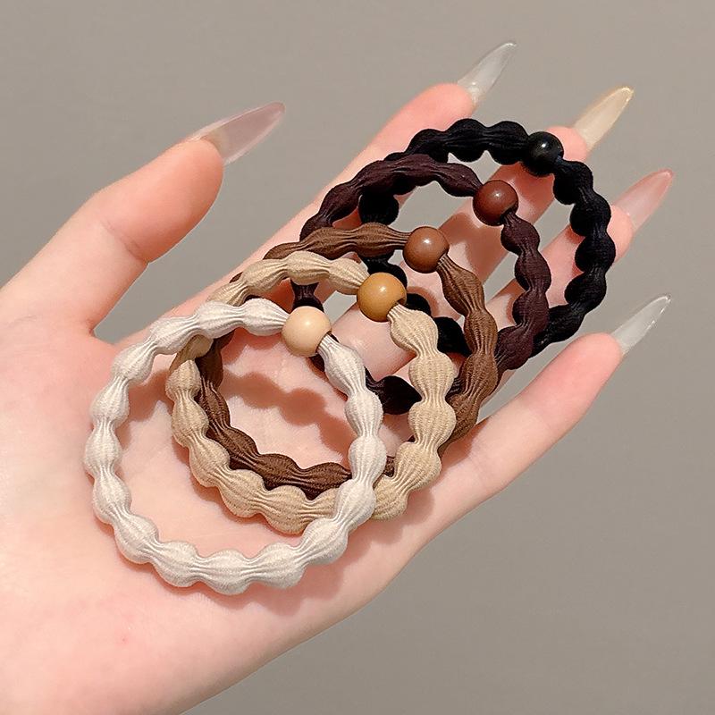 

Эластичные женские резинки для волос 2025: Прочные высокоэластичные резинки для хвоста