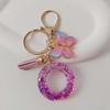 Purple Iridescent Resin Letter Keychain with Butterfly Tassel