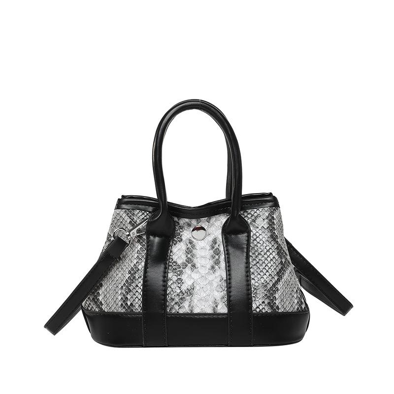 Wholesale New Product Personality Niche Design Snake Pattern Portable Bucket Bag Fashion High-end Temperament Versatile Messenger Women's Bag