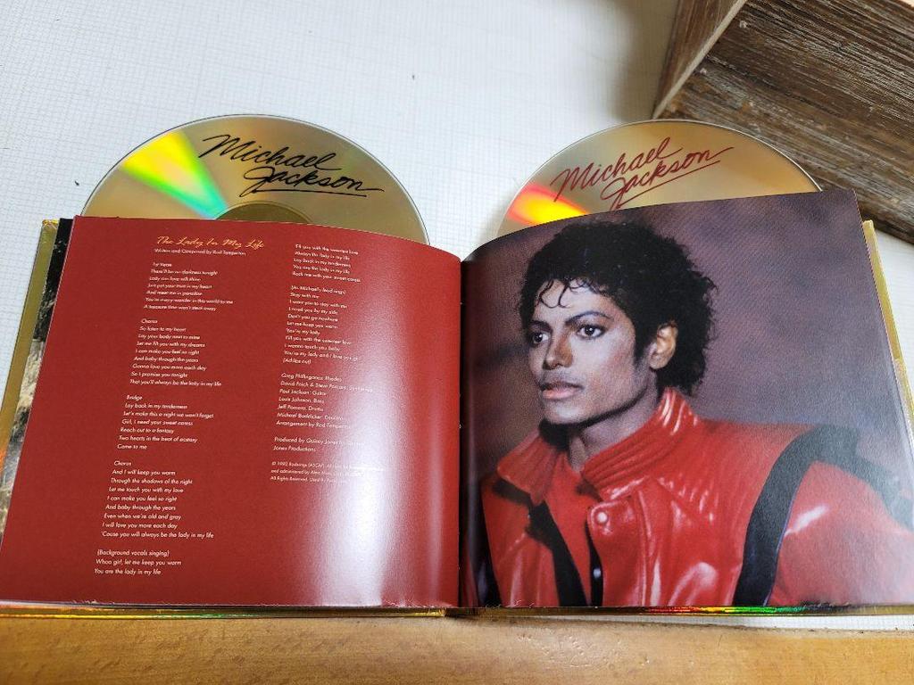 [USED] Thriller 25th Anniversary Edition, OFF THE WALL, and 3 Moonwalker DVDs.