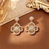 European and American Light Luxury Fashion Four-leaf Clover Earrings, Diamond-encrusted Hollow Temperament Retro Earrings, High-end New Niche Earrings