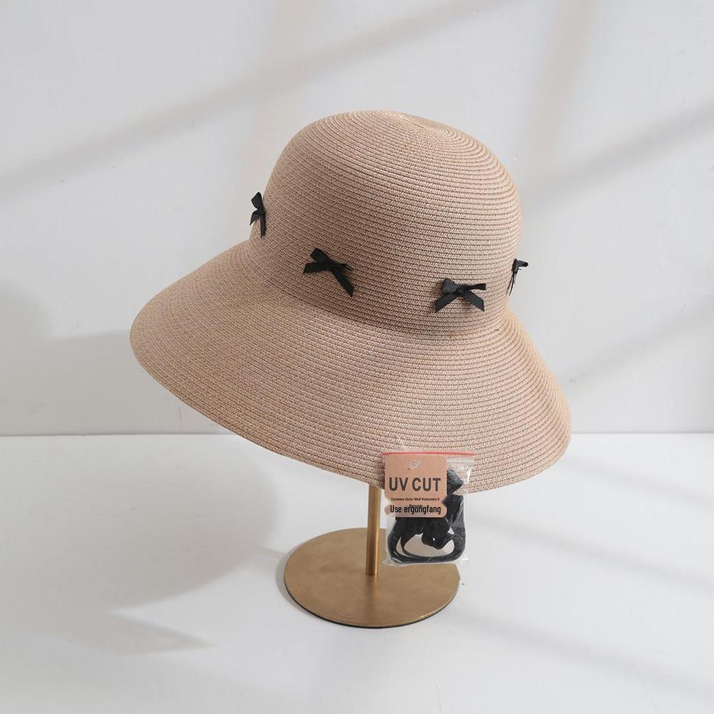 Women's Summer Sun Hat: Foldable Bow-Trimmed Straw Hat with Large Brim for Seaside Vacations