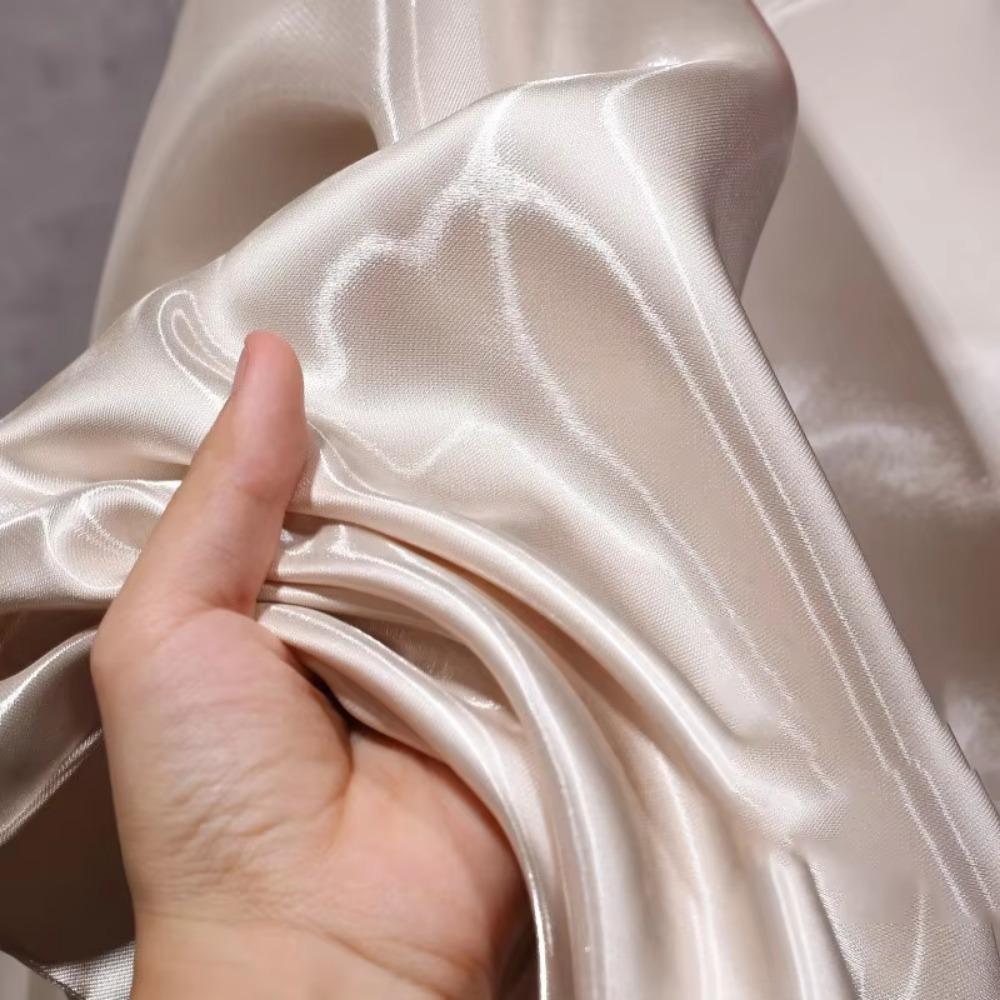 Polyester Liquid Water Satin Fabric Thickened Natural Reflective Clothing Fabric Crystal Silk Satin Wedding Dress Decorative