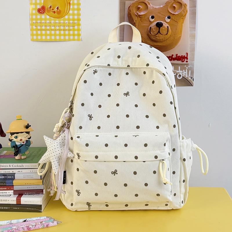 Schoolbag schoolbag junior high school girls girl heart atmosphere polka dot bow versatile high value female student backpack high school