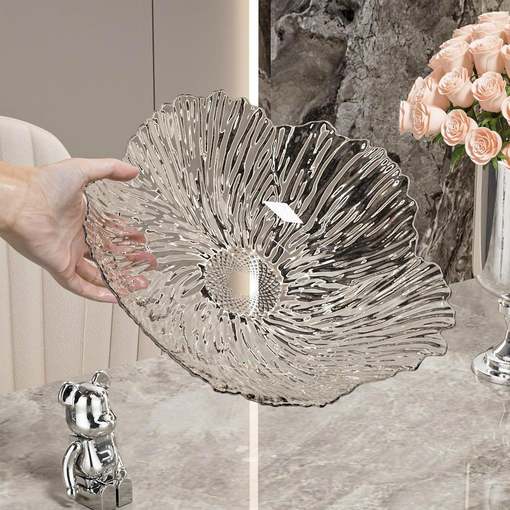 Transparente Obst- und Snack-Präsentationsplatte mit hohem Fuß: Modernes Licht-Luxus-Design für Wohnzimmer-Couchtische.