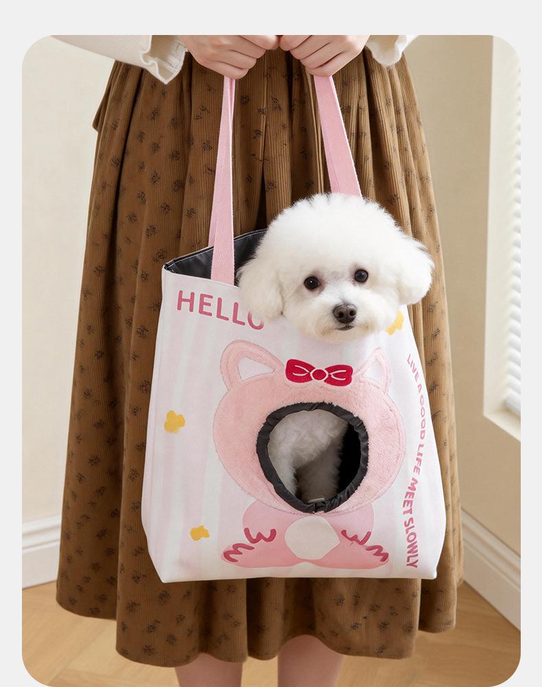 Portable, Breathable Canvas Cat Carrier Bag: Large Capacity, Lightweight, Crossbody, Head-Out Design, Cartoon Style for Travel