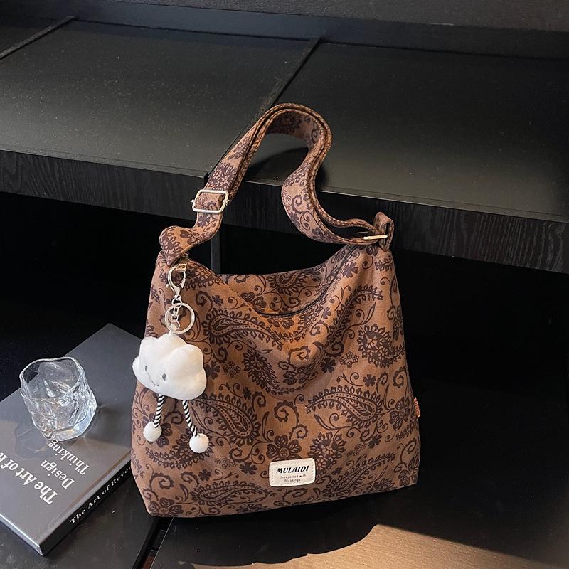 

Niche Versatile Lightweight Retro Tote: Fashionable Single Shoulder & Crossbody Bag for Women One Size