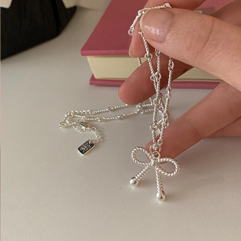 Dulce și răcoros colier cu fundă răsucită pentru femeie, design de nișă, senzație de lumină, lux, personalitate elegantă, modă, lanț pentru gât, lanț pentru claviculă