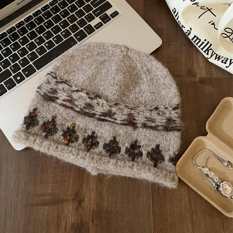Jacquard knitted crimped headgear women's autumn and winter warm new fashionable versatile face small wool hat