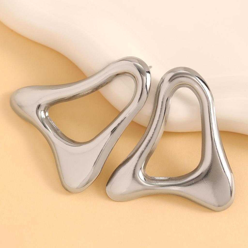 European & American Style Geometric Hollow Metal Texture Earrings: High-End Irregular Studs for Women