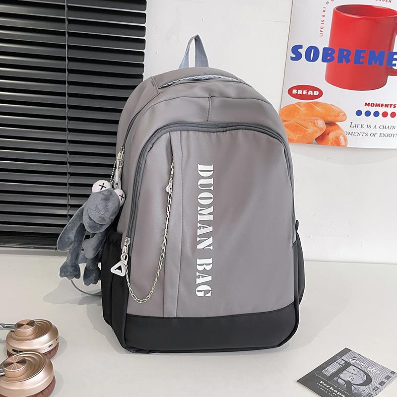Schoolbag schoolbag 1011 summer new Korean version simple anti-theft contrasting color backpack junior high school college student shoulder back