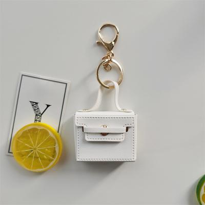 Modischer quadratischer Handtaschen-Schlüsselanhänger aus PU-Leder, Münzgeldbörse, süßer Airpods-Telefonhüllen-Anhänger, Taschenanhänger für Frauen und Mädchen, Schmuck