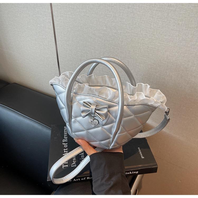 

Rhombus bow vegetable basket bag women s summer new niche messenger bag portable bucket bag серебряный