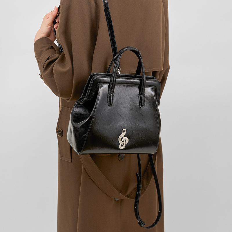 New niche high-end cowhide backpack women's small bag fashion commuter backpack leather handbag