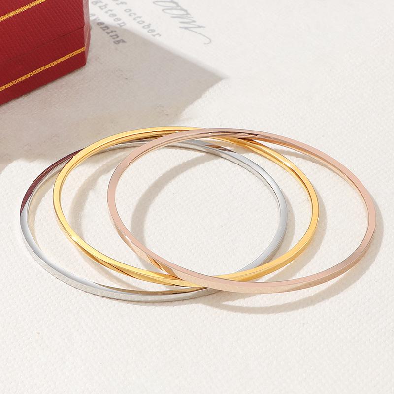 New Smooth Titanium Steel Bracelet: 18K Gold Plated Multi-Ring Stacking Thin Bracelet for Women - No Fade.