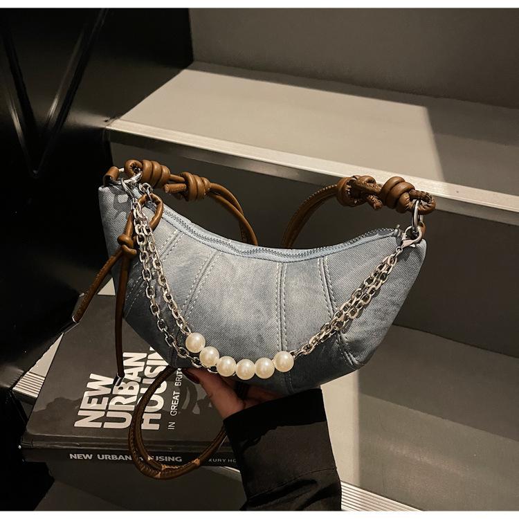 

This year, the popular super-hot niche bag women s 2025 new fashion versatile messenger bag shoulder dumpling bag croissant bag джинсовий синього кольору