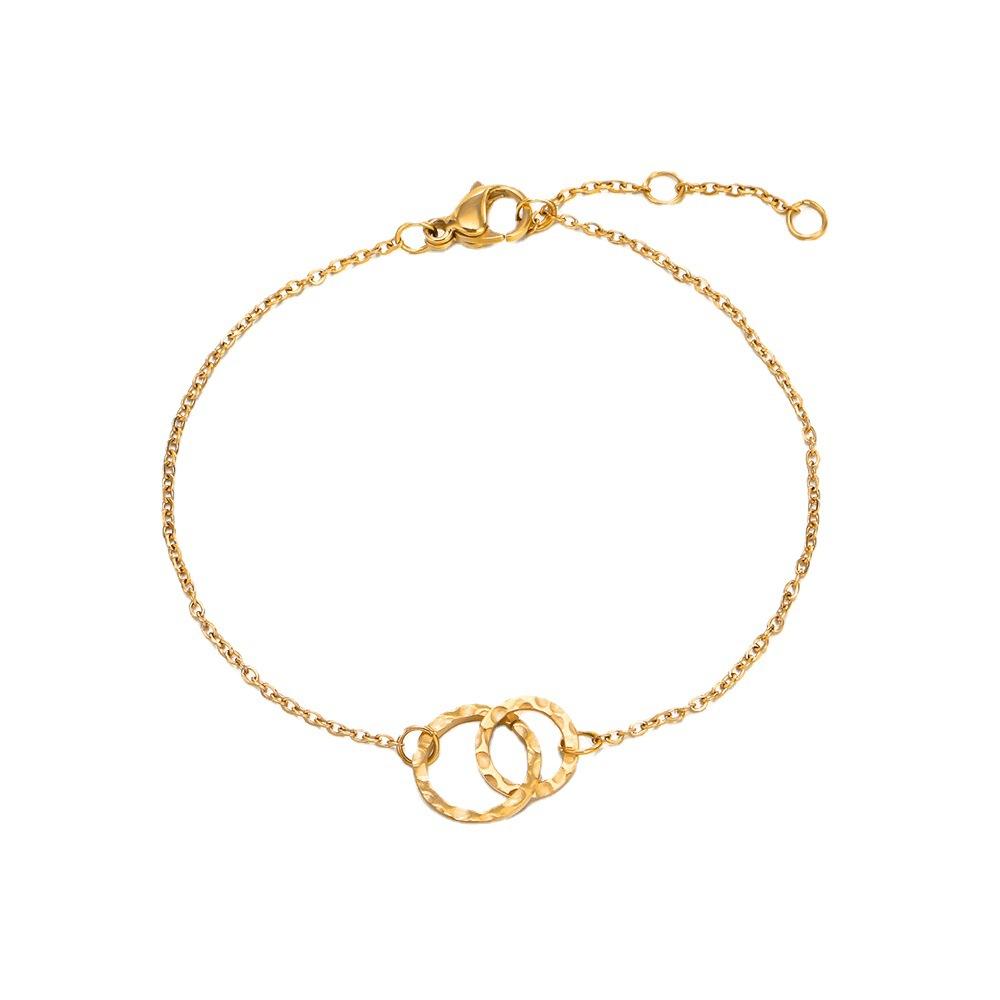 New simple stainless steel gold-plated round interlocking bracelet Korean version hollow beating texture bracelet women's tide