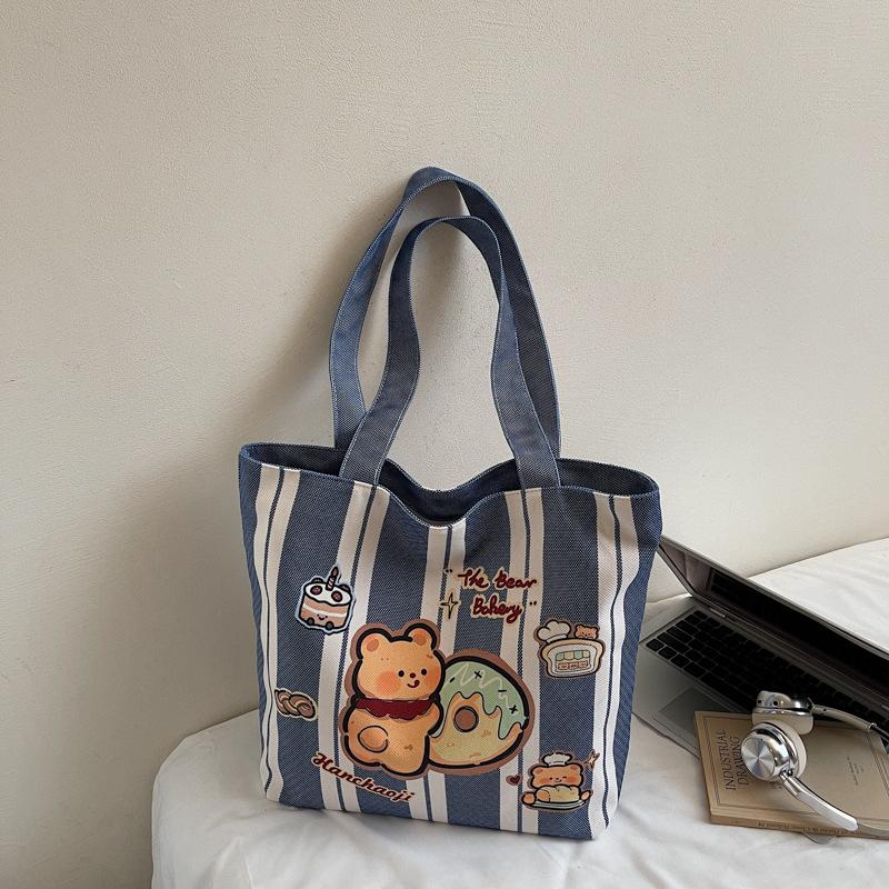 

Cartoon printed cute casual tote bag 2025 autumn new textured striped canvas bag fashionable shoulder bag