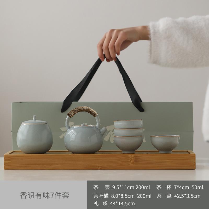 Dehua travel kung fu tea set small set household simple teapot ceramic teacup outdoor tea tray portable bag