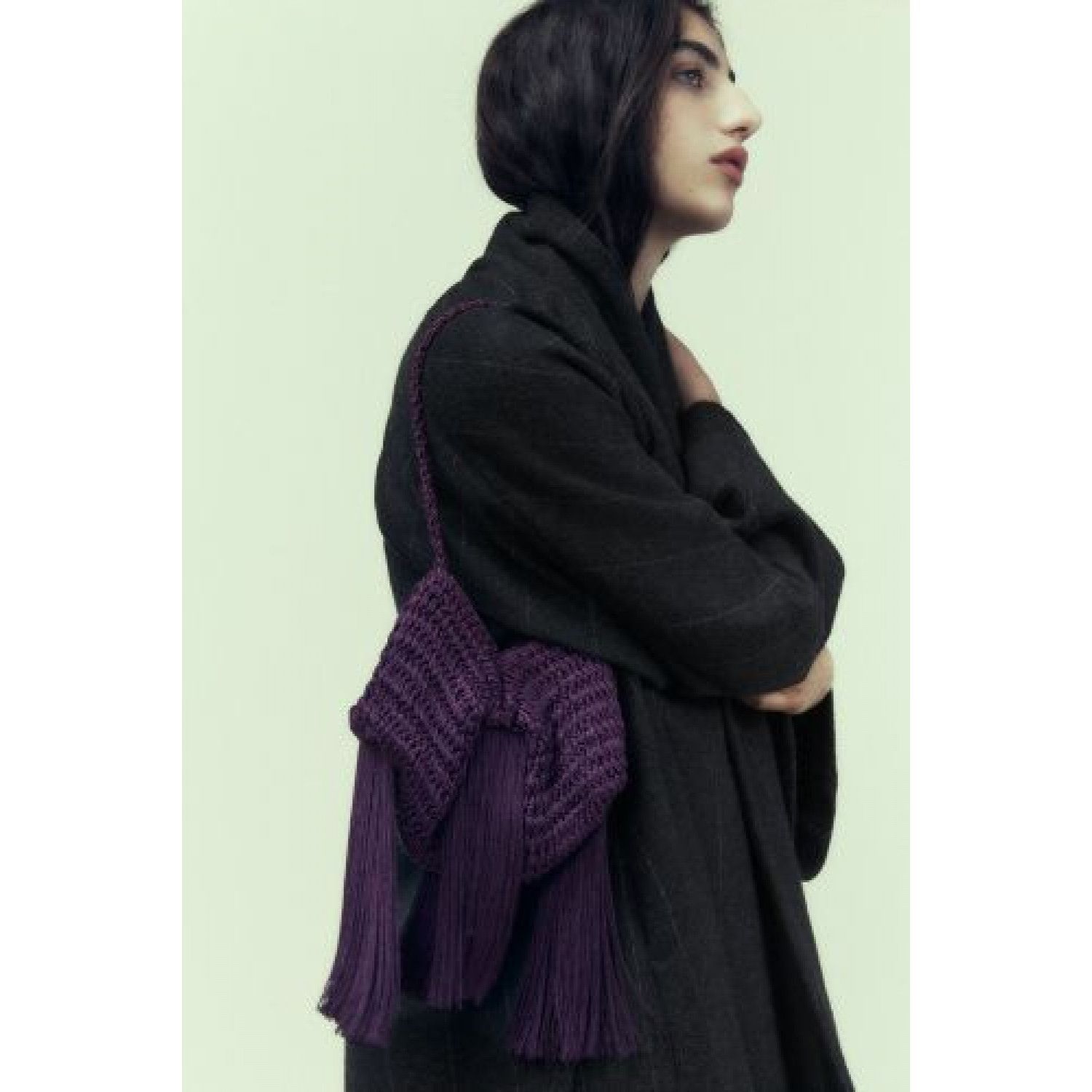 

WOVEN BUCKET BAG WITH FRINGING
