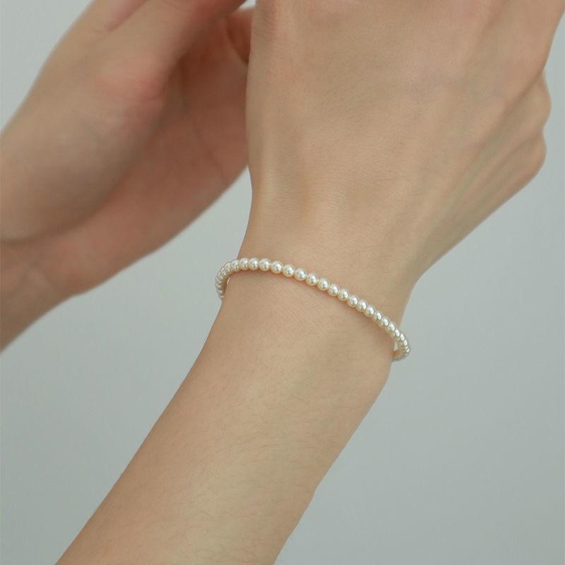 Imitation Hetian Jade Four-Leaf Clover Bracelet: Women s Light Luxury, Exquisite High-End Retro Rotating Luck Bead Jewelry