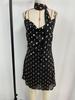 European Spicy Girl Black Polka Dot Halter Dress - Open Back, A-Line Short Summer 2026 Edition.